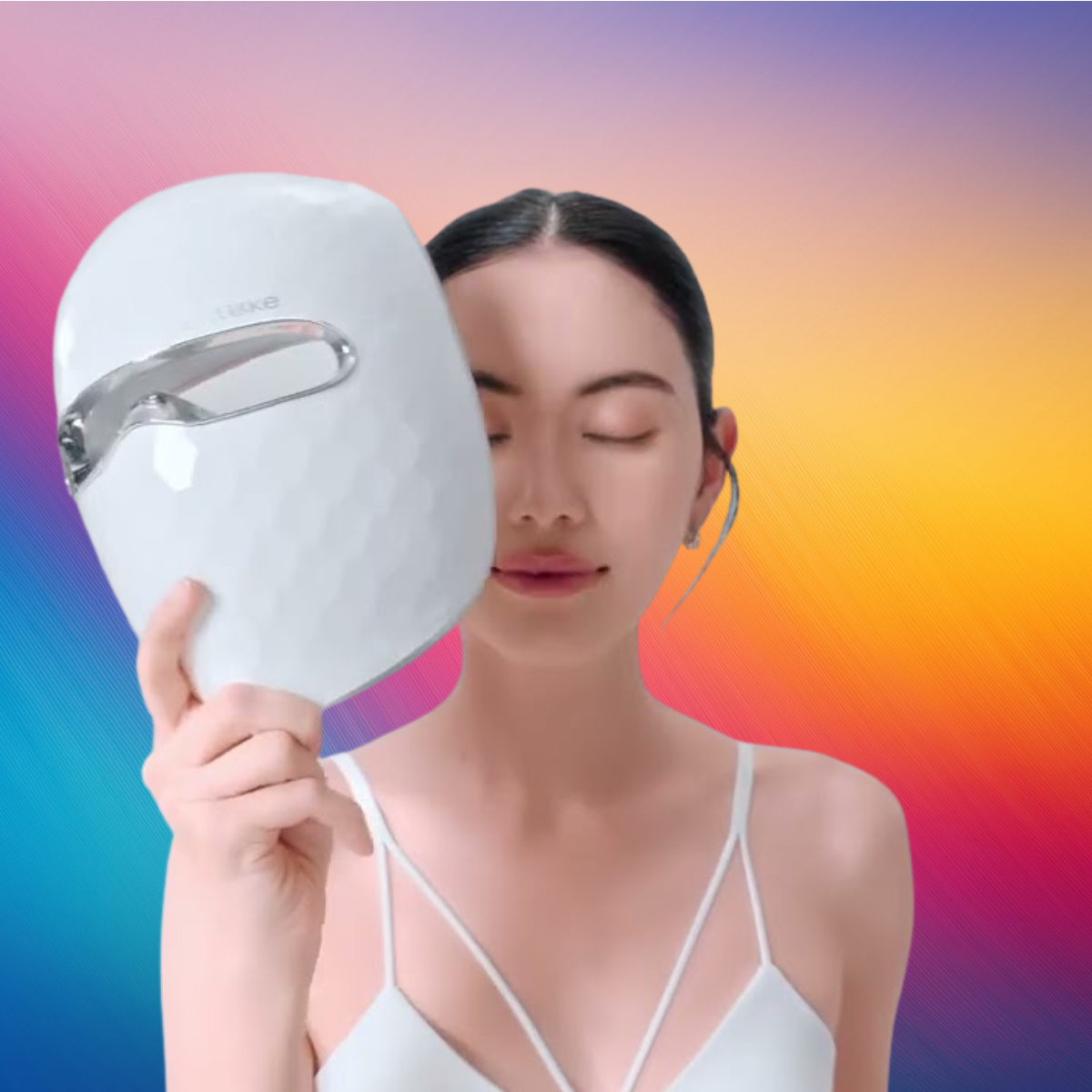 Woman wearing the Ulike Reglow LED light therapy mask